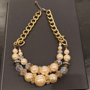 Elegant Gold and Pearl Statement Necklace